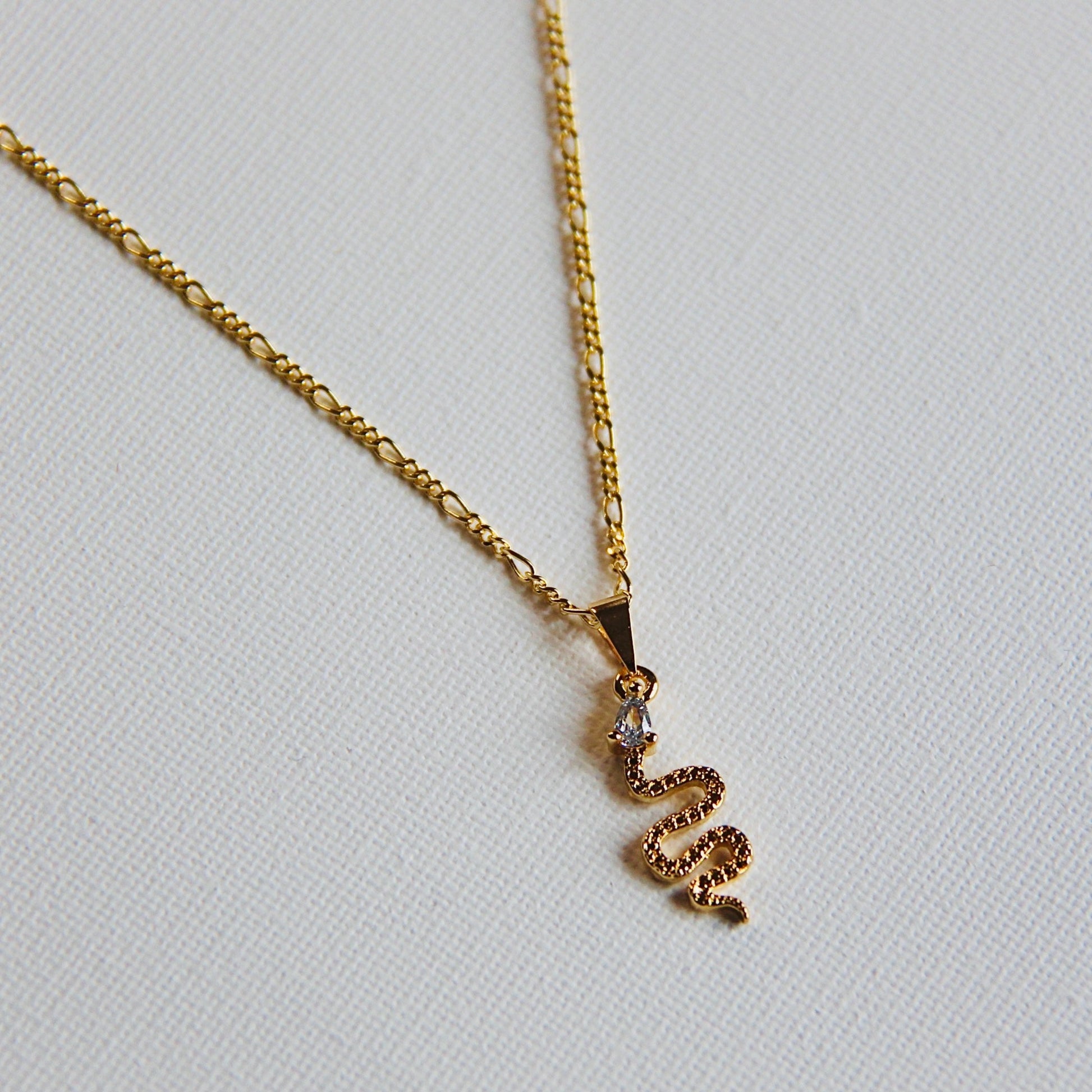 snake chain necklace in gold filled with figaro style chain front view